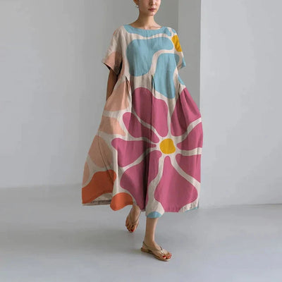 https://cdn.shopify.com/s/files/1/0741/0774/8619/files/robe-longue-boh_me-imprim_-fleurs-rose.webp?v=1726495666